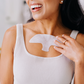woman wearing frownies soft cotton serum patch on chest for chest wrinkles