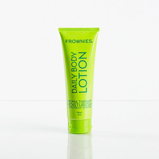 Frownies daily body lotion aroma therapy moisturizer non GMO, organic and natural. Pictured on a clean white background