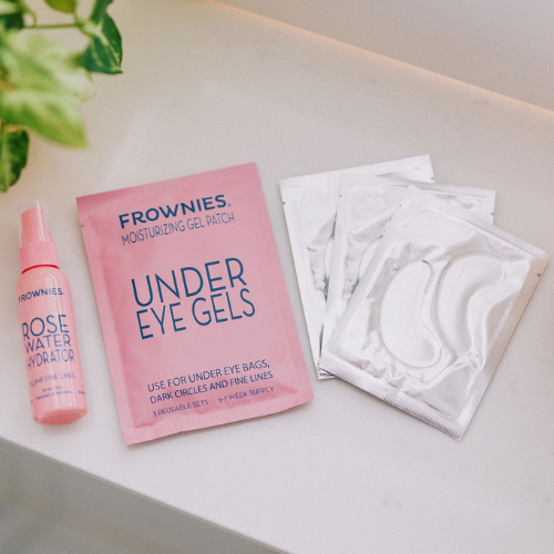 Frownies rose water hydrator spray, under eye gels pictured next to each other with the under eye gels laid out next to the package 