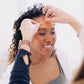 FBE (Forehead between the eyes) being applied to a womans forehead 