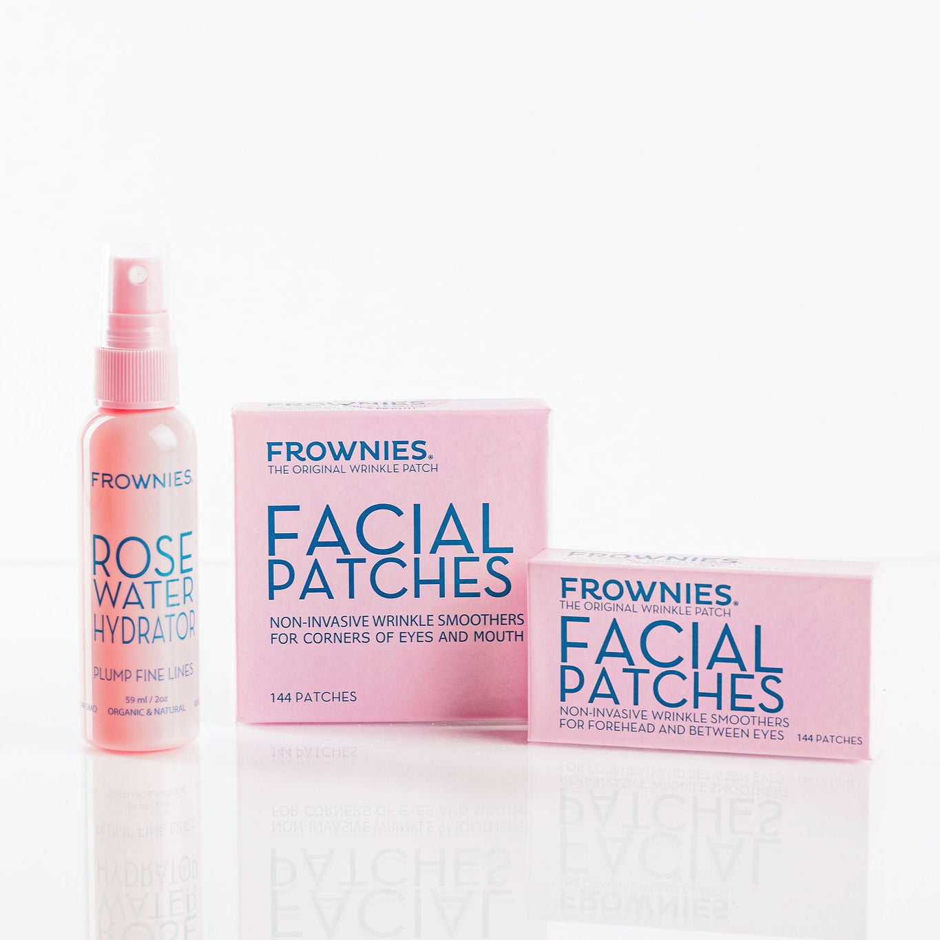 Frownies FBE and CEM facial patches shown next to Frownies rose water hydrator spray on a clean white background 